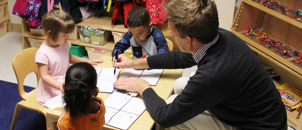 Teacher with preschool students