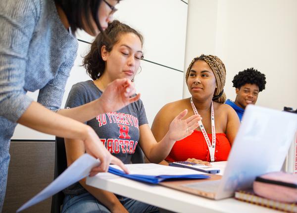 Barney finance students listen to a lecture in class